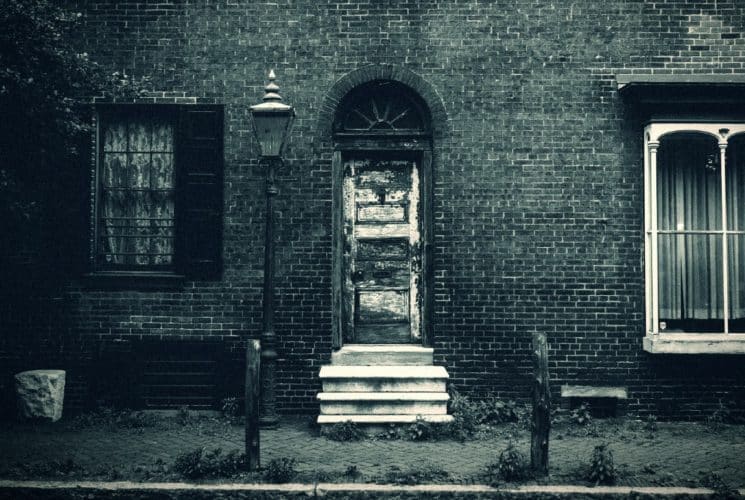 Black and white photograph of a historic brick building